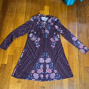 About A Girl dress with long sleeves berry size xs used in good condition